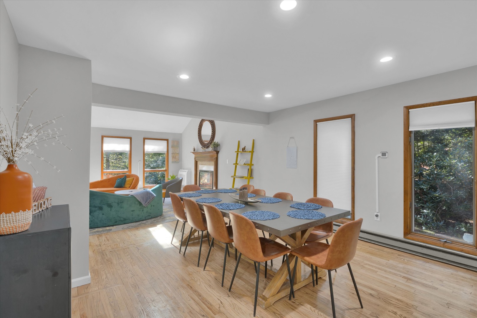 Share family dinners and lively conversations around the rustic 10-person dining table with scenic views.