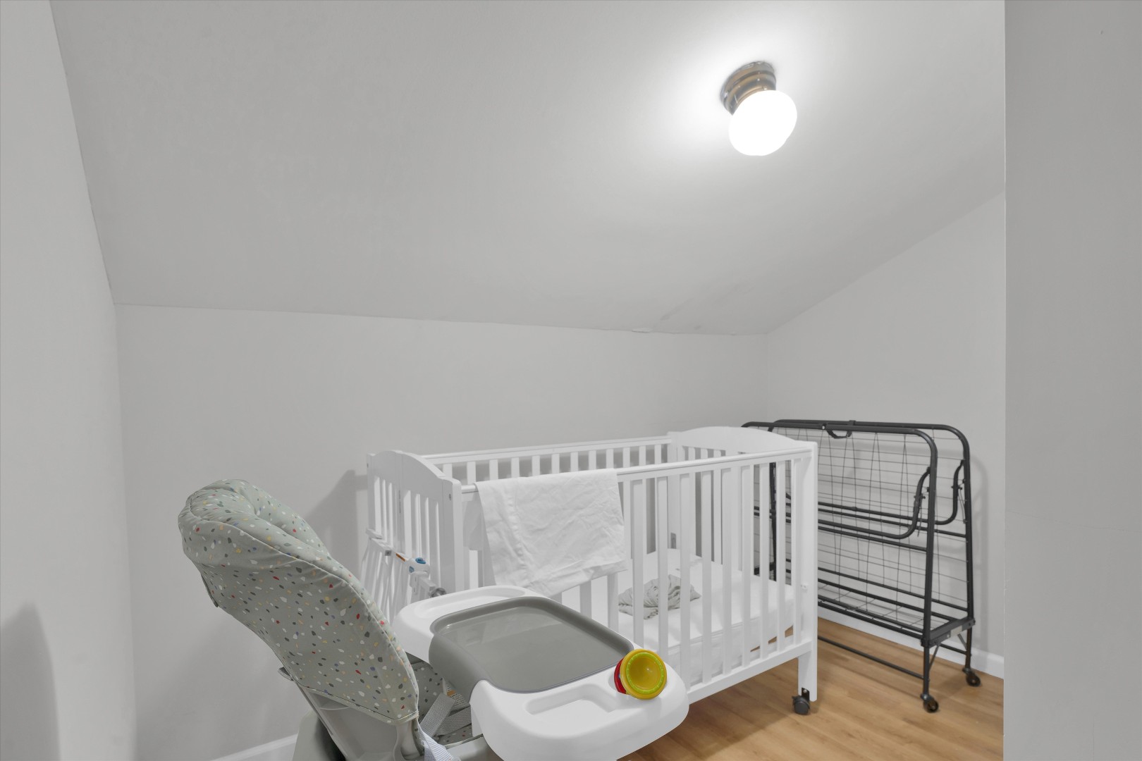 Family-friendly touches include a comfortable baby crib setup for guests traveling with little ones.