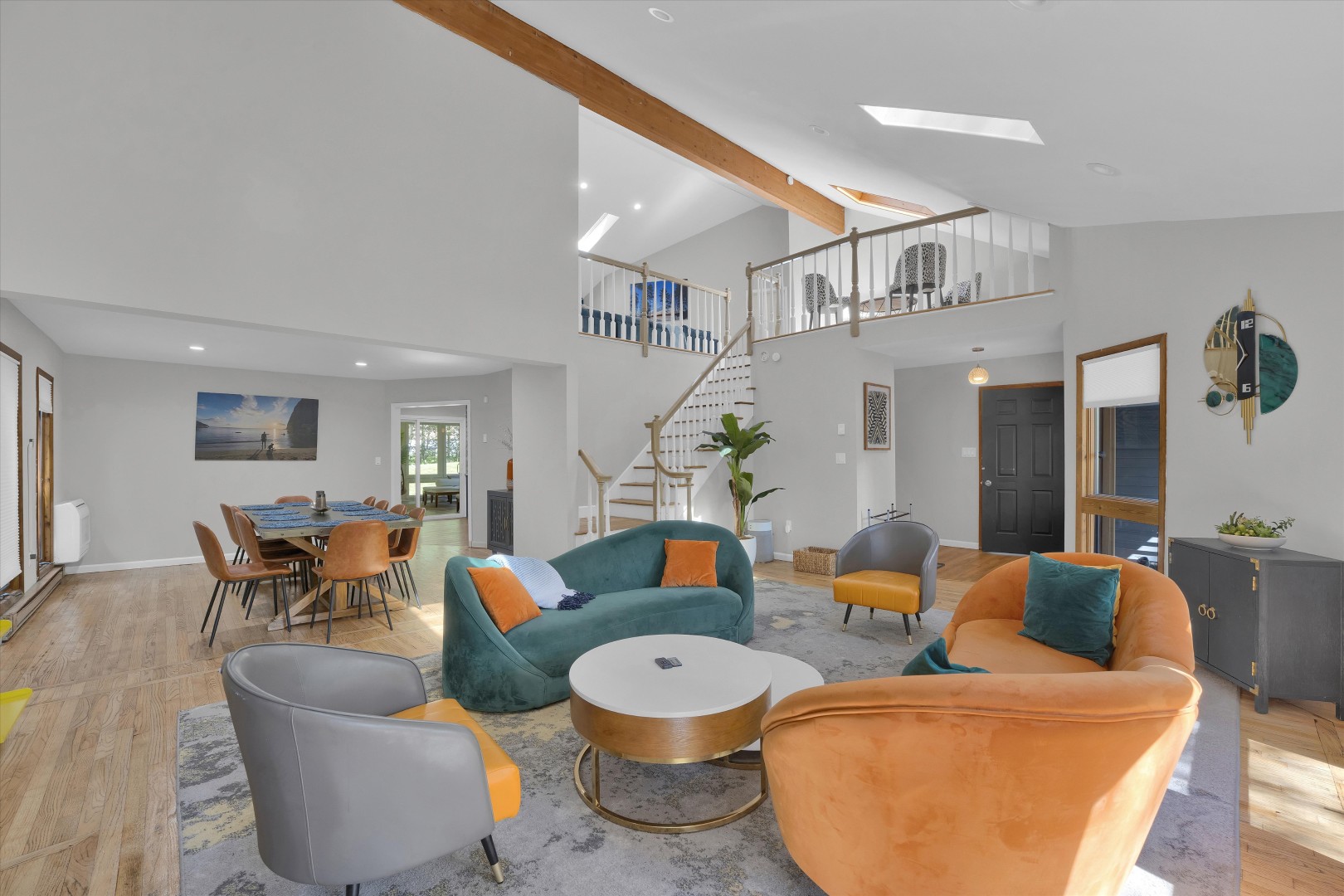 Kick back and relax in the bright, open living room - a comfortable spot for family movie nights or catching up after a day out.