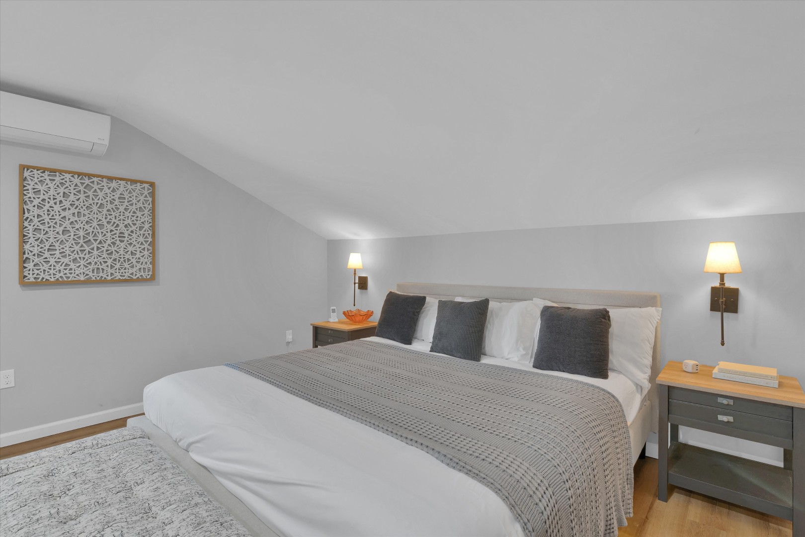 Designed for restful nights, this cozy bedroom features soft lighting and plush bedding to help you recharge.