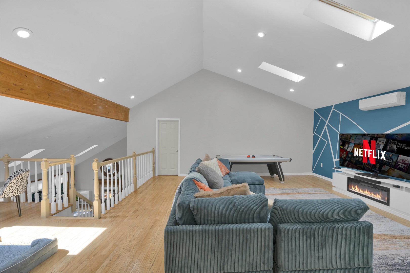 Chill together on the deep L-shaped sectional in this open upper-level entertainment lounge.